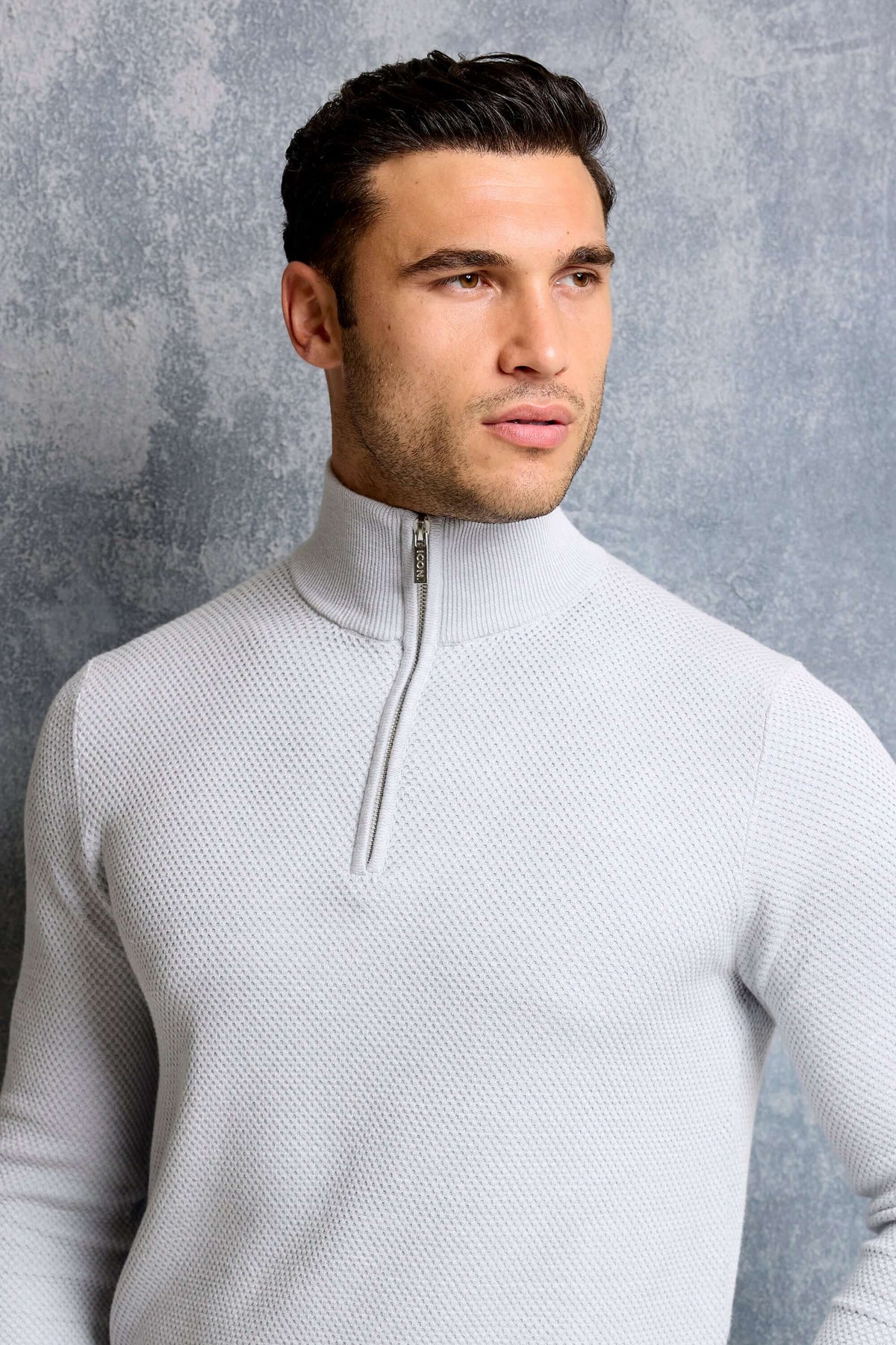 THE FABIO QUARTER ZIP SWEATER